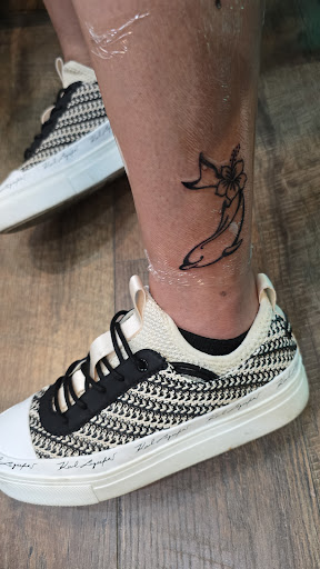 Explore lip tattoo ideas for guys, creative tattoo ideas in Honolulu, available at Aloha Tattoo Waikiki Hilton Hawaiian Village Rainbow Bazaar