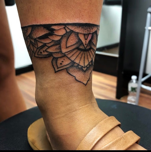 Explore one piece tattoo ideas for guys, creative tattoo ideas in Keyport, available at Taboo Tattoos