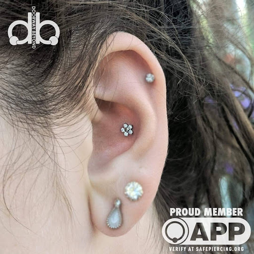 Explore tattoo ideas for female thigh, creative tattoo ideas in Bridgewater, available at Doorway Beyond Body Arts