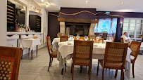 Atmosphère du Restaurant français Hôtel - Restaurant Reygrobellet à Saint-Germain-de-Joux - n°1