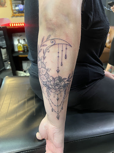 Explore cross wrist tattoo ideas, creative tattoo ideas in Linn Creek, available at Hillard Skillard Tattoos, LLC.