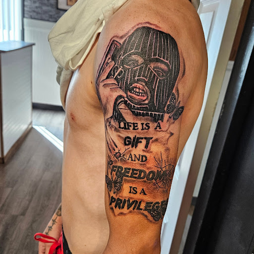 Explore male side tattoo ideas, creative tattoo ideas in Cumberland, available at Queen City Ink