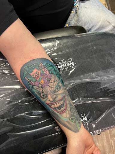 Explore tattoos sleeves ideas for guys, creative tattoo ideas in Mount Morris, available at Dagger Face Tattoos