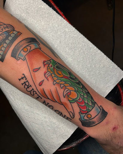 Explore neon tattoo ideas, creative tattoo ideas in Edgewood, available at Wild Coyote Tattoo