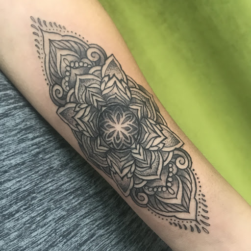 Explore fish tattoo ideas for men, creative tattoo ideas in Tecumseh, available at Lucid Tattoo Gallery