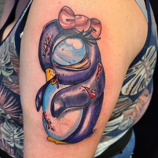 Explore land before time tattoo ideas, creative tattoo ideas in Cumberland, available at Queen City Ink