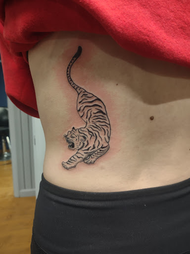 Explore women's quarter sleeve tattoo ideas, creative tattoo ideas in Williamston, available at Inkd Tattoo Parlor