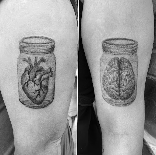 Explore voodoo doll tattoo ideas, creative tattoo ideas in Cheyenne, available at The T.R.I.B.E. Zoo, LLC Tattoo