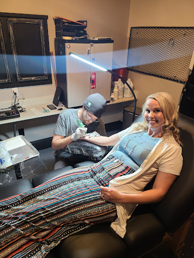 Explore name on neck tattoo ideas, creative tattoo ideas in Myrtle Beach, available at Elite Ink Tattoos of Myrtle Beach