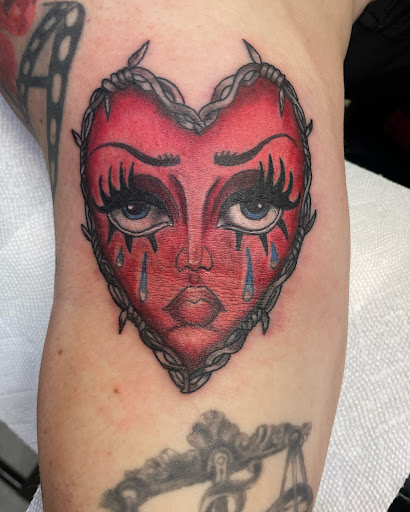 Explore never give up tattoo ideas, creative tattoo ideas in Cincinnati, available at Opal Moon Tattoo