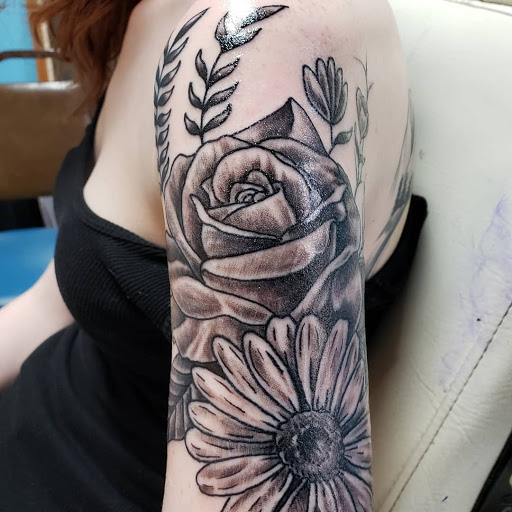 Explore lung cancer tattoo ideas, creative tattoo ideas in Houghton, available at Edge Tattoo Inc
