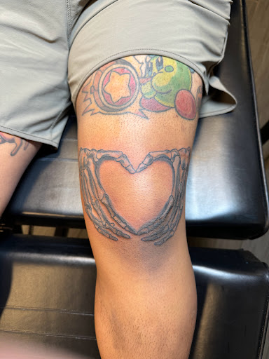 Explore kiss lip tattoo ideas, creative tattoo ideas in Palm Harbor, available at Angry Owl Tattoo and Piercing