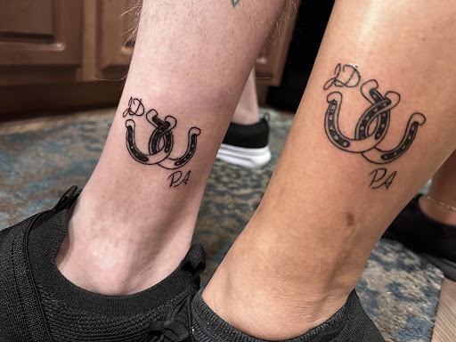 Find mom of 4 tattoo ideas for your next unique tattoo in Branson at Tattoo Therapy