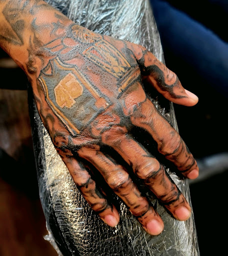 Explore november birth flower tattoo ideas, creative tattoo ideas in Jamaica, available at Shimmy Fingers Ink Tattoos