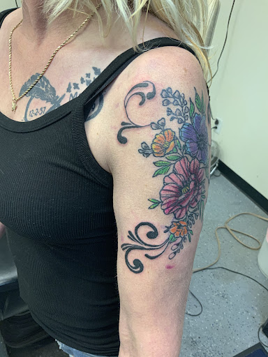 Explore number 4 tattoo ideas, creative tattoo ideas in Valley Park, available at Full Spectrum Tattoo