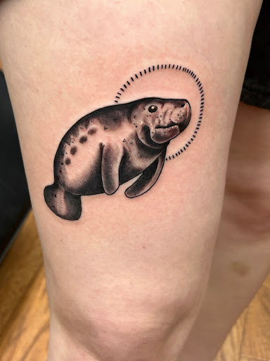 Explore dogwood tattoo ideas, creative tattoo ideas in Shelbyville, available at Stage Left Tattoo and Piercing