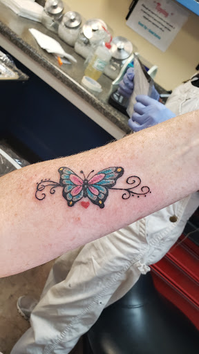 Explore tattoo ideas for side of stomach, creative tattoo ideas in Orange Beach, available at Orange Beach Tattoos