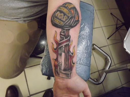 Find inbetween boob tattoo ideas for your next unique tattoo in Princeton at Custom Dreams Tattooing and Body Piercing