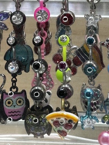 Explore tattoo ideas behind the ear, creative tattoo ideas in Fresno, available at Most Wanted Tattoo