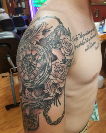 Tattoo Shop «Liquid Swordz», reviews and photos, 27 N Washington St, Ypsilanti, MI 48197, USA