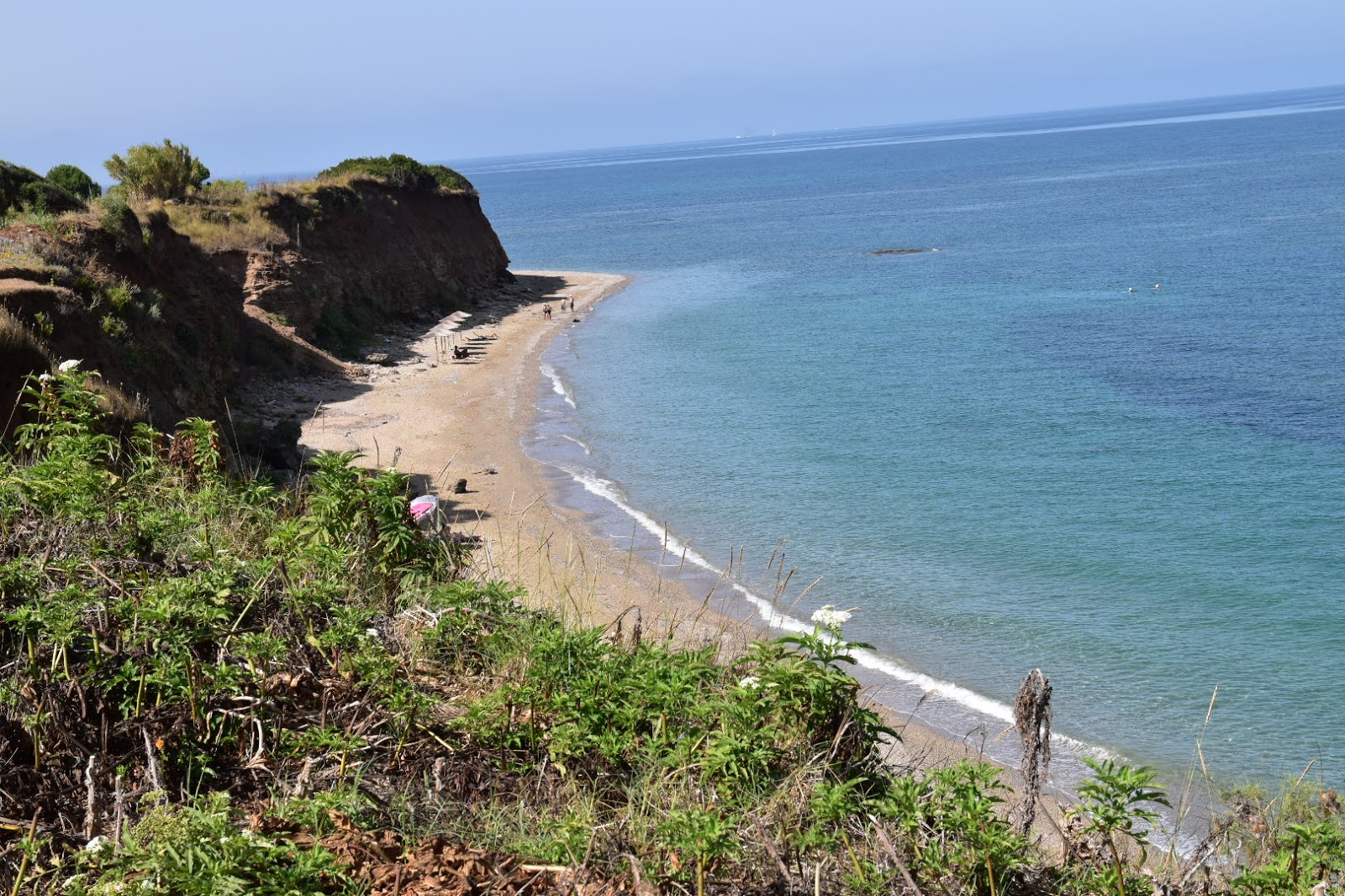 Foto di Faros beach con una superficie del sabbia marrone