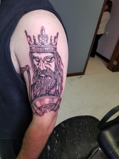 Explore excalibur tattoo ideas, creative tattoo ideas in Shelby, available at T&C Tattoo Studios