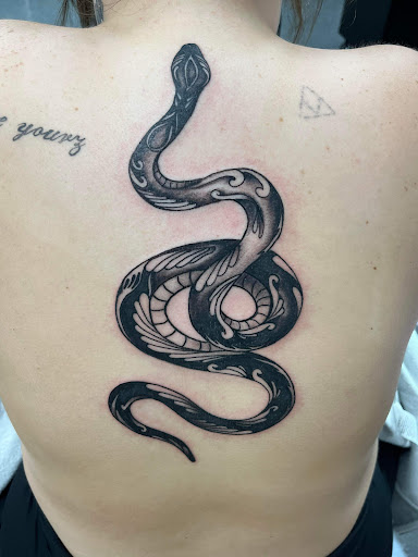 Explore one piece tattoos ideas, creative tattoo ideas in La Vista, available at InkedUp Needles