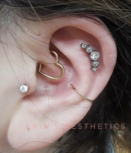 Explore ideas for stomach tattoos, creative tattoo ideas in Bella Vista, available at Erins Aesthetics