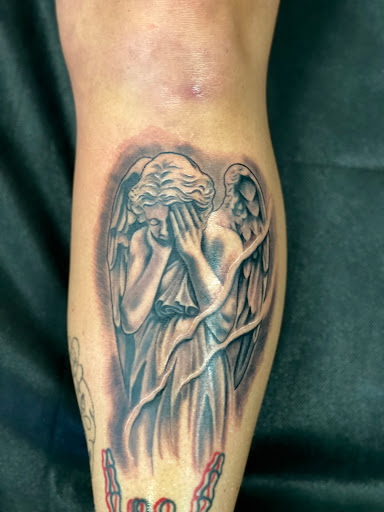 Find cool armband tattoo ideas for your next unique tattoo in Youngstown at Twisted Metal Custom Body Art