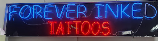 Explore dagger tattoo ideas, creative tattoo ideas in Hickory, available at Forever Inked