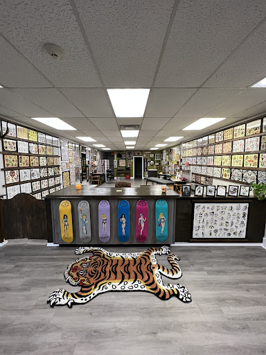 Explore red cardinal tattoo ideas, creative tattoo ideas in North Smithfield, available at Great Tattoo