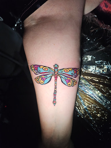 Explore tattoo ideas for cosmetologist, creative tattoo ideas in Angola, available at Hoodlum Ink