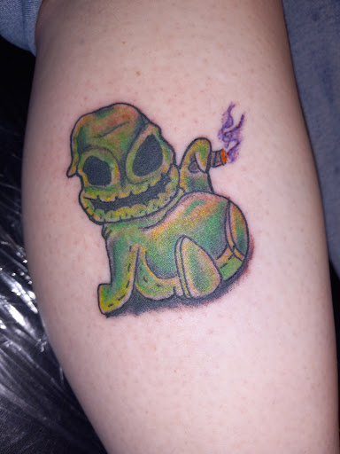 Explore mf doom tattoo ideas, creative tattoo ideas in Seymour, available at American Gypsy Tattoo Corp.