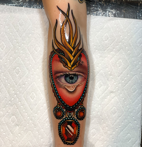 Explore globe tattoo ideas, creative tattoo ideas in Senoia, available at Messenger Tattoo Studio