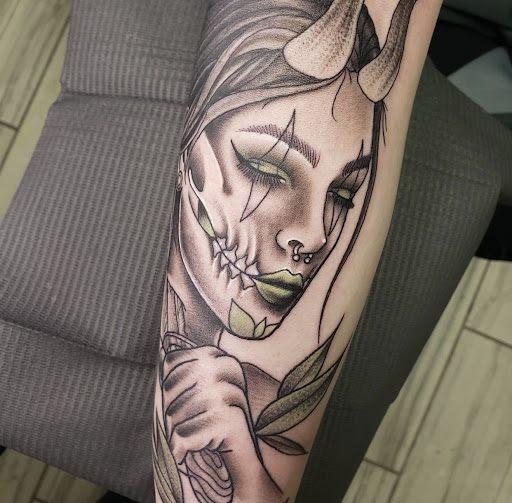 Explore jawline tattoo ideas, creative tattoo ideas in Palatka, available at Ink Rush Tattoo Black Tide