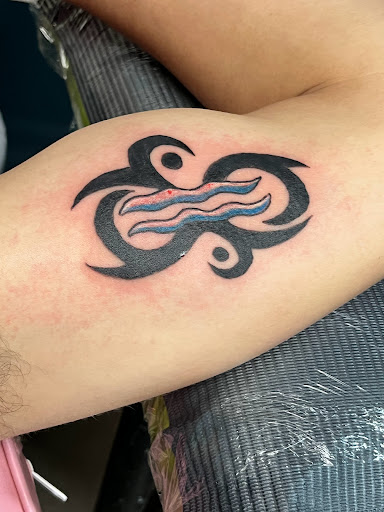 Explore care bear tattoo ideas, creative tattoo ideas in Augusta, available at Shanes Custom Tattoos and Piercings