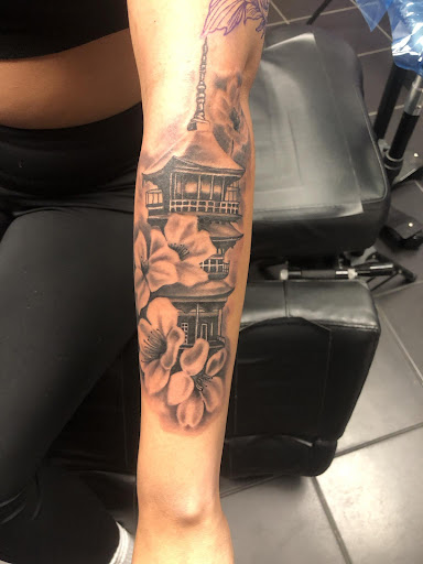 Explore men arm sleeve tattoo ideas, creative tattoo ideas in Greensboro, available at Tate Street Tattoo Co, LLC