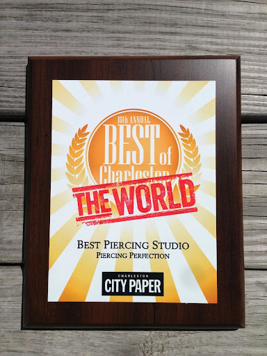 Explore tattoo ideas space liquid tattoo, creative tattoo ideas in North Charleston, available at Piercing Perfection