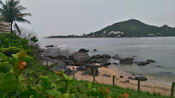 Foto von Praia Lara und die siedlung