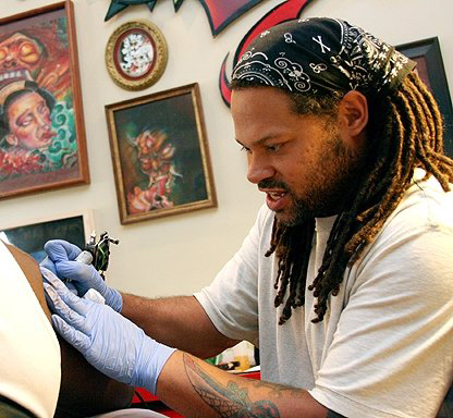 Explore tattoo ideas mother and son, creative tattoo ideas in Milwaukee, available at Vantage Point Tattoo Milwaukee