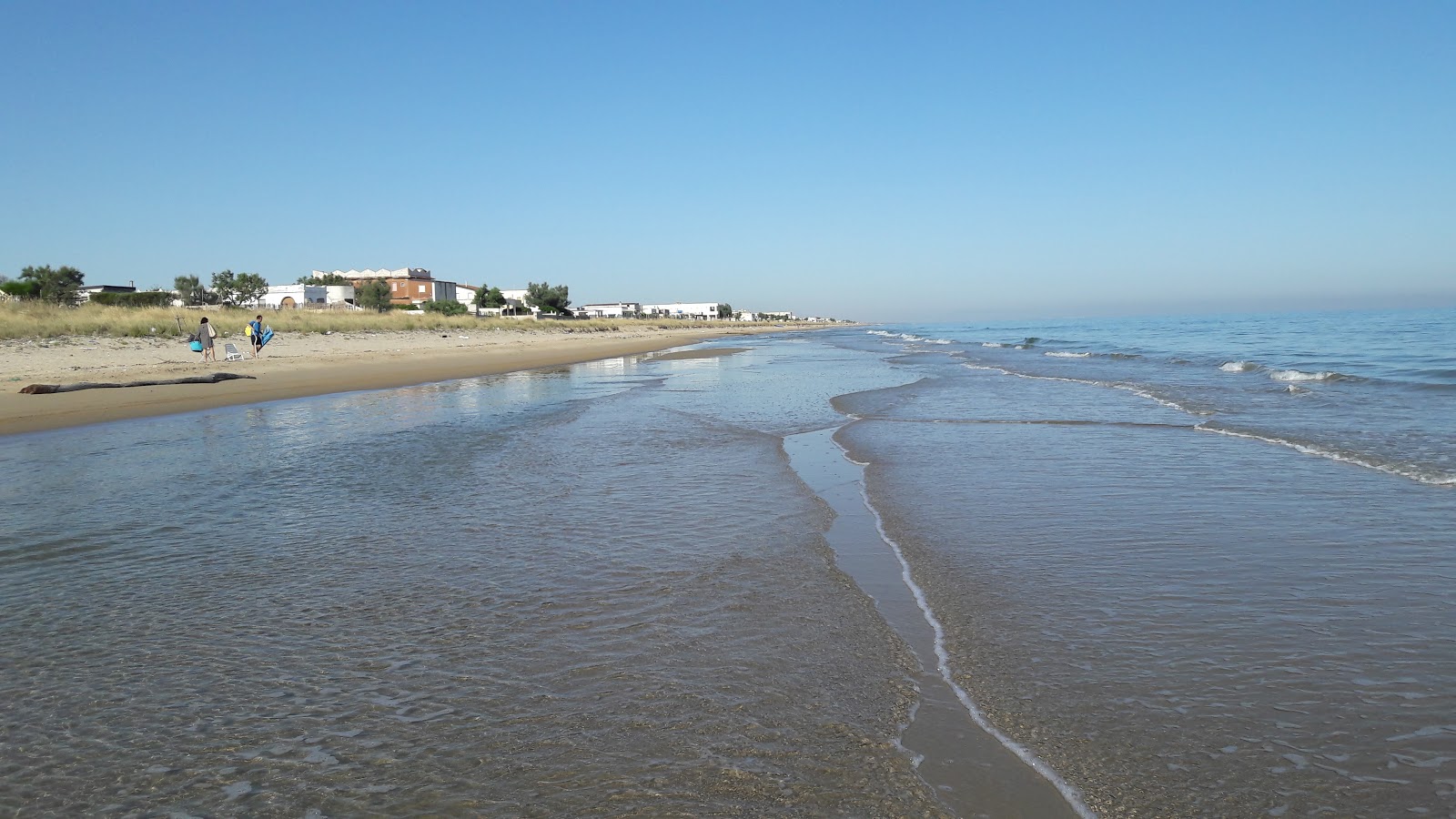 Fotografie cu Spiaggia di Tammaricella cu drept și lung