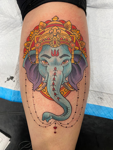 Explore arm tattoo ideas flowers, creative tattoo ideas in Des Moines, available at Hooligan Tattoo