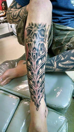 Find tattoo ideas crown for your next unique tattoo in Bowling Green at Taboo Tattoos and Piercings