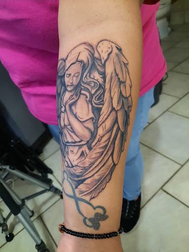 Explore blue line tattoo ideas, creative tattoo ideas in Espanola, available at Daydreamer Tattoo