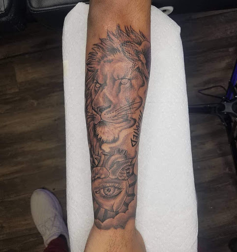 Explore arm mens tattoo ideas, creative tattoo ideas in Goose Creek, available at Red Kirin Tattoo