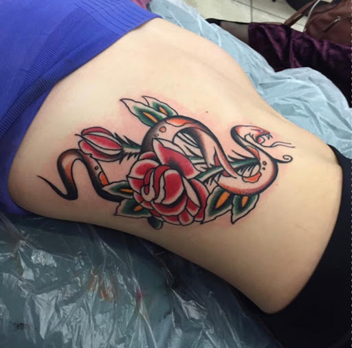 Explore let them hand tattoo ideas, creative tattoo ideas in Katy, available at Artistic Impressions Tattoo Studio