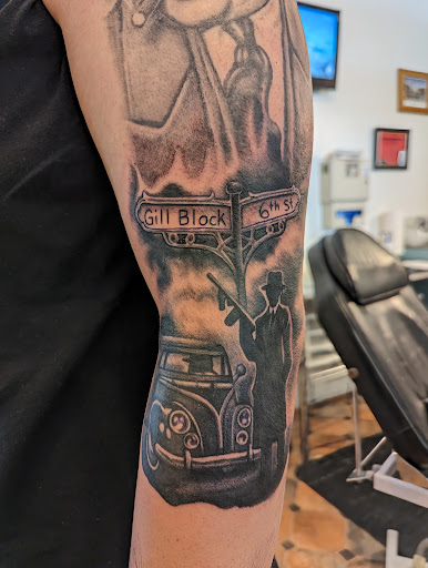 Explore elbow tattoo ideas for guys, creative tattoo ideas in Hebron, available at Explosive Ink Tattoo