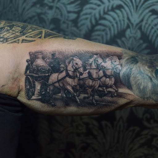 Explore angel tattoo ideas, creative tattoo ideas in Saint Albans, available at 181 Tattoo