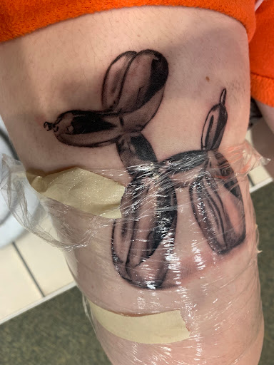 Explore hellscape battle sleeve tattoo ideas, creative tattoo ideas in Grovetown, available at Art Collective Tattoos & Piercings