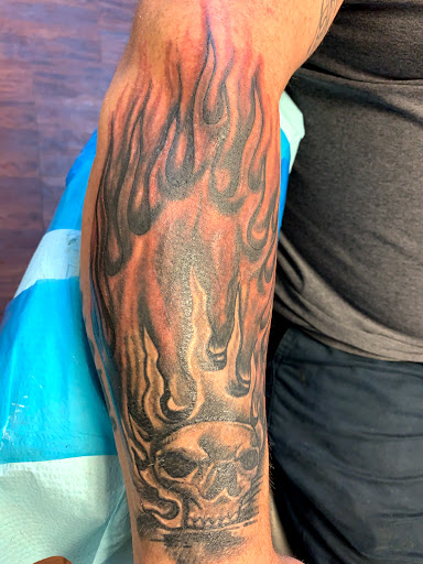 Find goth tattoo ideas for men for your next unique tattoo in Seymour at American Gypsy Tattoo Corp.